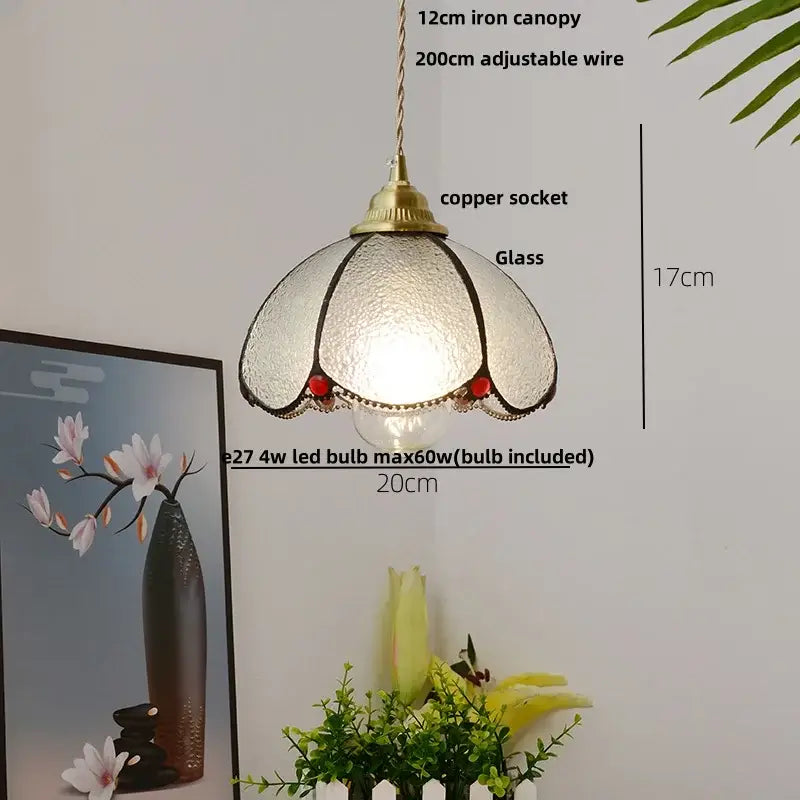 Vintage brass petal glass led pendant light with textured frosted shade, black trim, and red beads for kitchen use