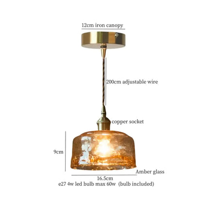 A warm amber glass vintage brass pleated led pendant light with brass iron canopy and adjustable wire for dining room decorbites