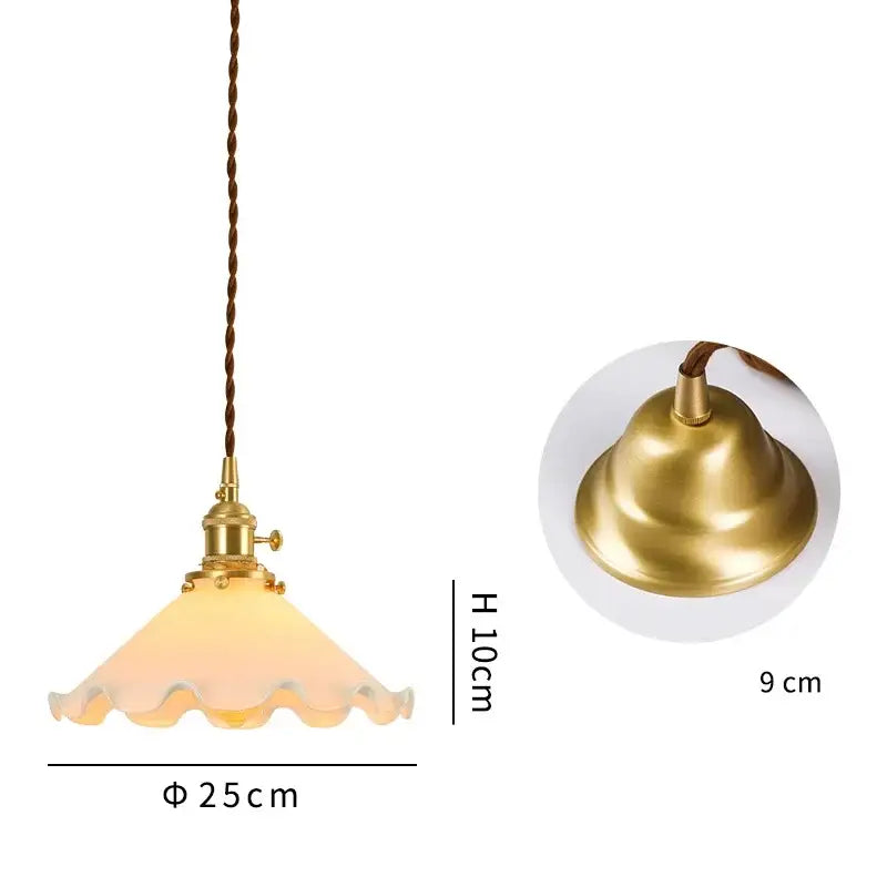 Vintage brass pendant light with warm frosted scalloped glass shade designed as a glass led pendant lamp
