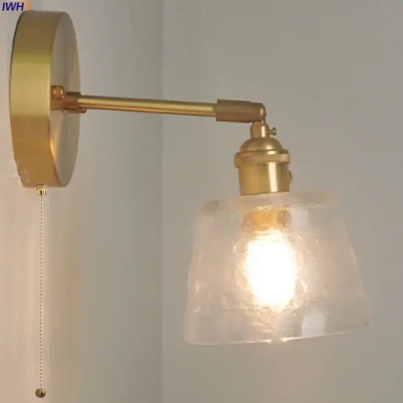 Brass-finished led wall lamp with decorbites clear glass textured shade and pull chain for vintage bedroom decor