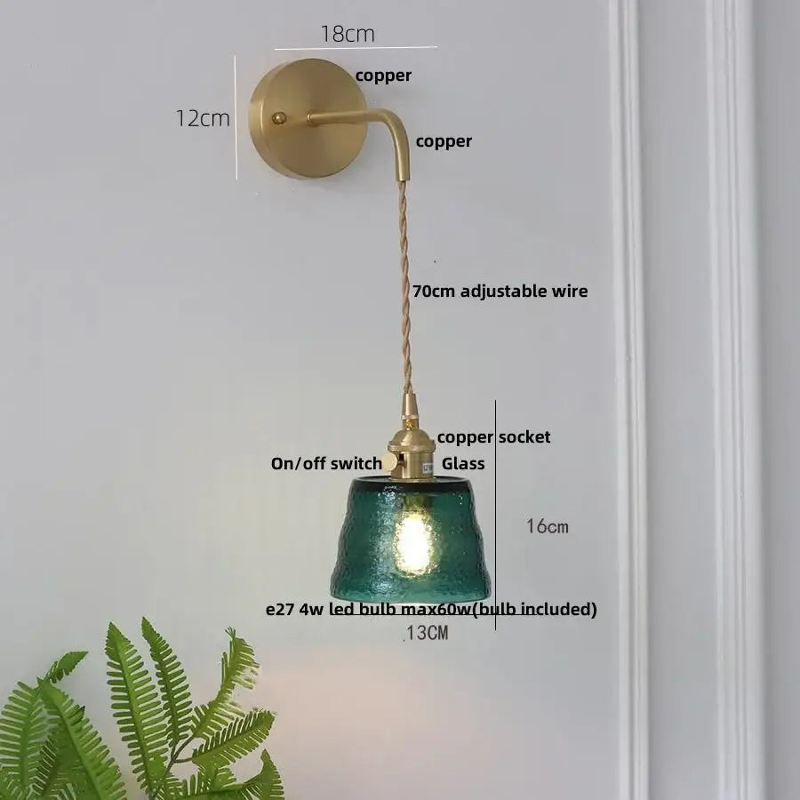 Teal-green textured glass led wall lamp with copper-finished mount and adjustable wire by decorbites clear glass