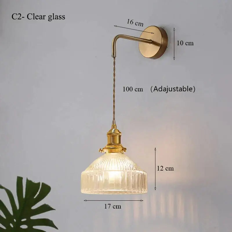Vintage brass wall lamp with adjustable chain and ribbed clear glass shade suitable for living room glass shade led use