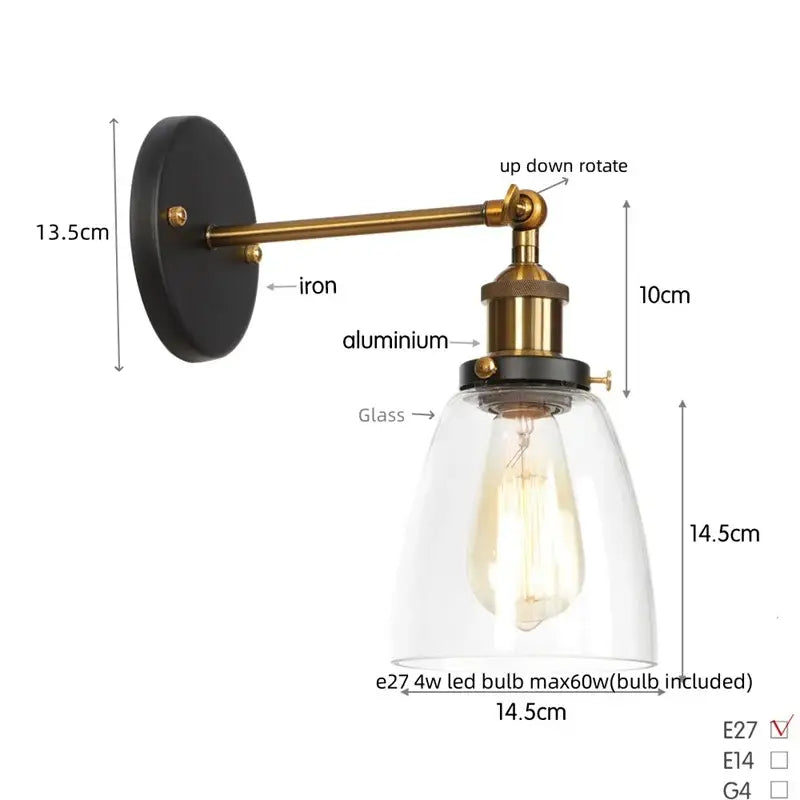 Vintage brass wall light fixture with black iron backplate clear glass dome and exposed edison bulb for bedroom use