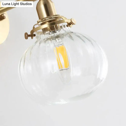 Vintage brass wall light with champagne clear ribbed glass shade and led bulb for bedroom lighting