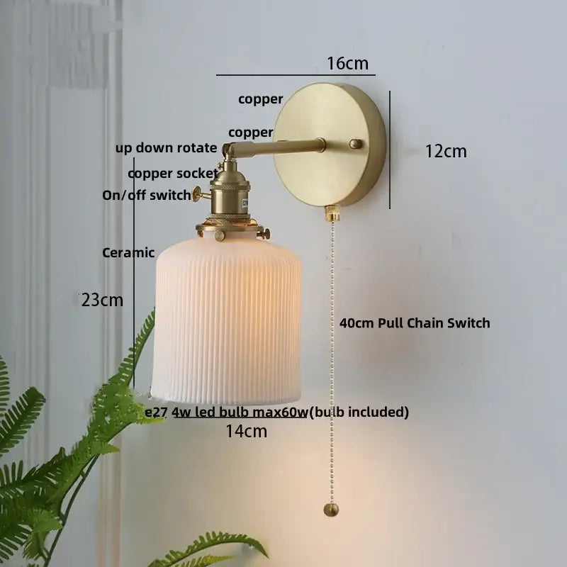Vintage brass wall light with a ribbed off-white ceramic knob shade and knob switch for bedroom decorbites ceramic knob