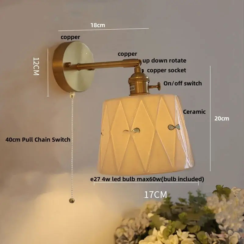 Vintage brass wall light with copper finish ceramic shade featuring geometric facets knob switch and decorbites ceramic knob