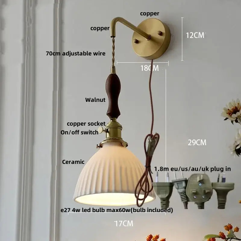 Vintage brass wall light with ribbed glass, knob switch, and copper wire featuring a walnut handle and decorbites ceramic knob
