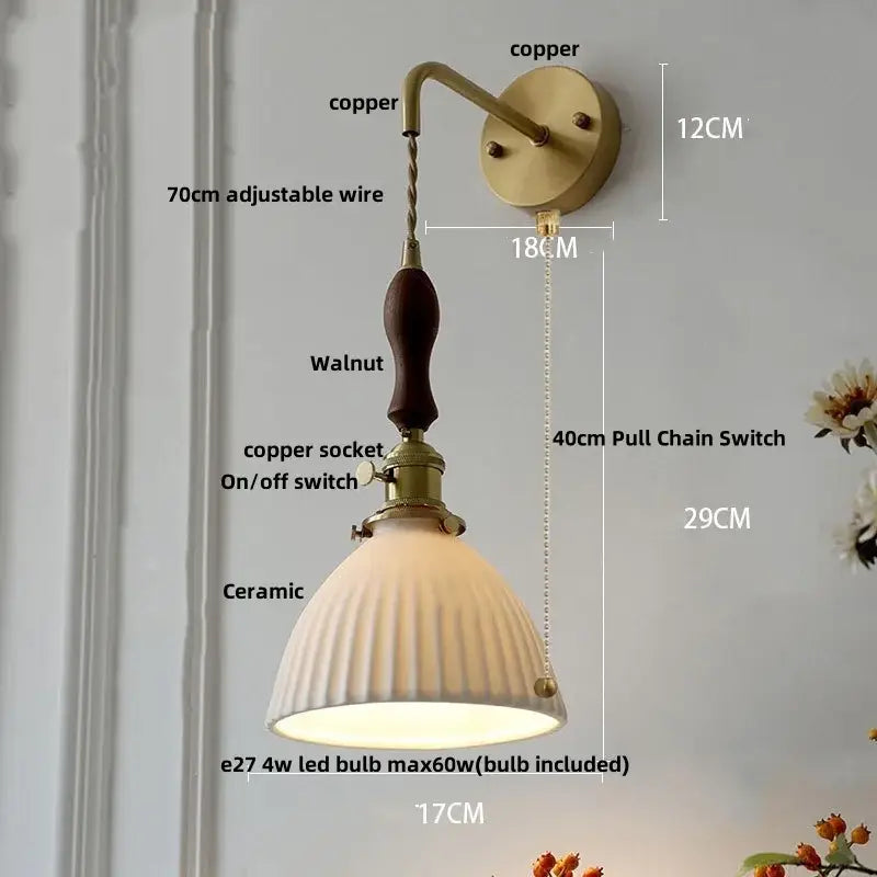 Vintage brass wall light with copper and walnut finish, ribbed ceramic shade, and knob switch decorbites ceramic knob