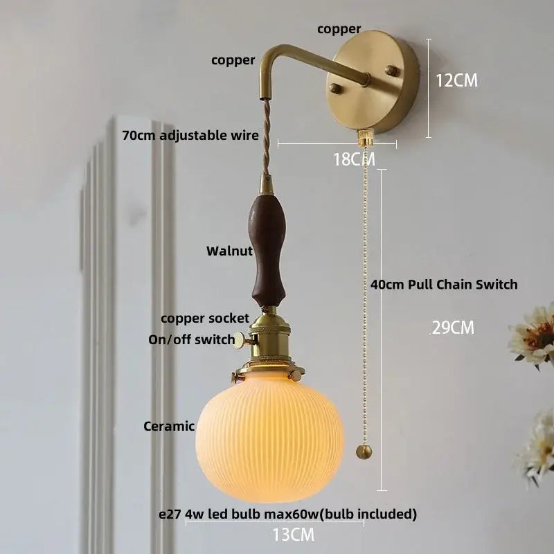 Vintage brass wall light with ribbed ceramic globe, walnut handle, and decorbites ceramic knob switch for bedroom decor