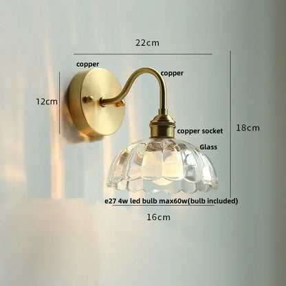 Vintage brass wall sconce with scalloped clear glass shade in antique brass finish for stairways decorbites clear glass