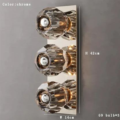 Chrome-finished wall lamp with three faceted crystal shades and g9 bulbs from decorbites crystal wall lamp collection