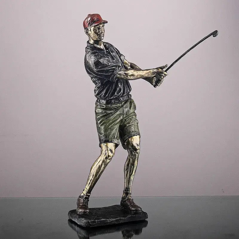 Vintage bronze decorbites golf figure of a bronze-colored player wearing a red cap and holding a club office statue
