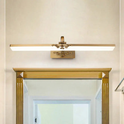 Gold-finished ornate vintage bronze wall light fixture with rectangular led panel and decorative scrollwork for bedroom vanity