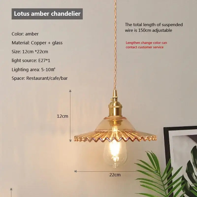 Amber-colored lotus-shaped glass pendant light with copper and polished chrome for dining room illumination