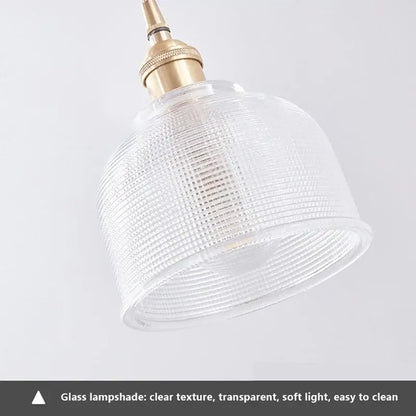 Vintage brown and polished chrome glass pendant light with clear textured glass lampshade and brass fixture for dining room