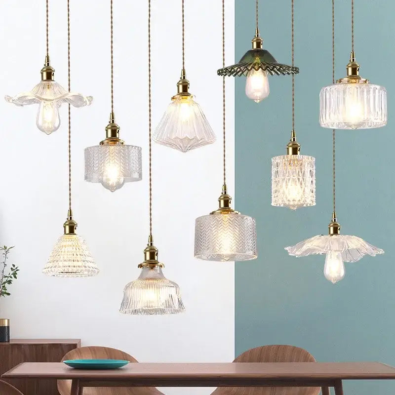 Vintage brown and polished chrome glass pendant light with brass fixtures and clear textured shades for dining room