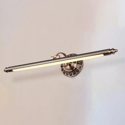 Antique brass-finished metallic sconce wall light with elongated design and fluted base for bedroom with led bulbs maximum wattage use
