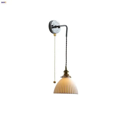 Vintage ceramic led wall sconce with cream ribbed glass shade and brass accents for elegant bedroom decorbites ceramic led lighting
