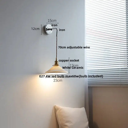Vintage ceramic led wall sconce with brass copper socket, white ceramic shade, and adjustable iron arm for bedroom decorbites ceramic led