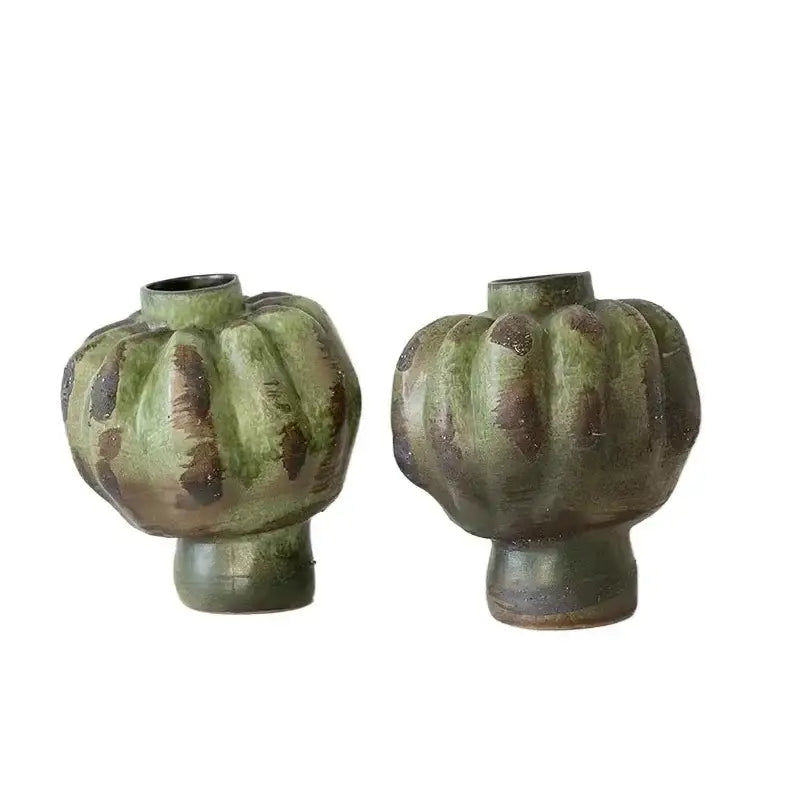 Two rustic green vintage ceramic vases with textured segmented design and brown patina for living room decorbites decor