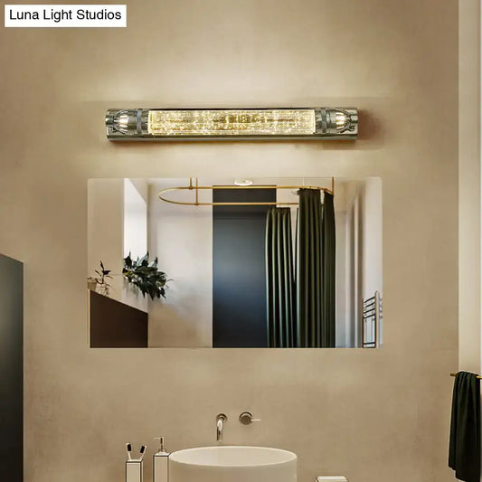 Modern vintage chrome and crystal led vanity light bathroom fixture with crystal-encrusted panel emitting warm illumination