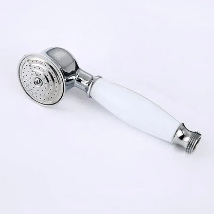 Vintage chrome and white ceramic shower hand holder featuring a chrome-finished showerhead with perforated spray face