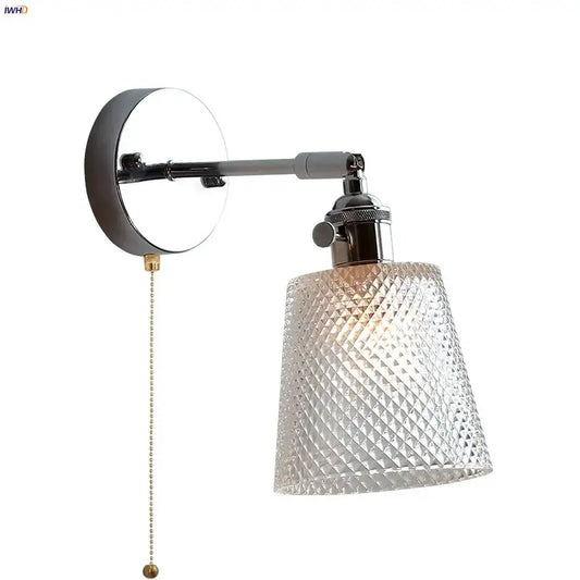 A vintage chrome clear glass wall sconce with textured glass shade and pull chain for bedroom decorbites clear glass