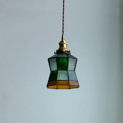 Vintage colorful glass tiffany pendant lamp with brass fixture featuring green teal amber and black panels for dining room decorbites colorful glass