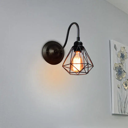 Vintage copper decorbites iron cage wall sconce with black wrought iron cage guard and exposed filament bulb for bedroom light