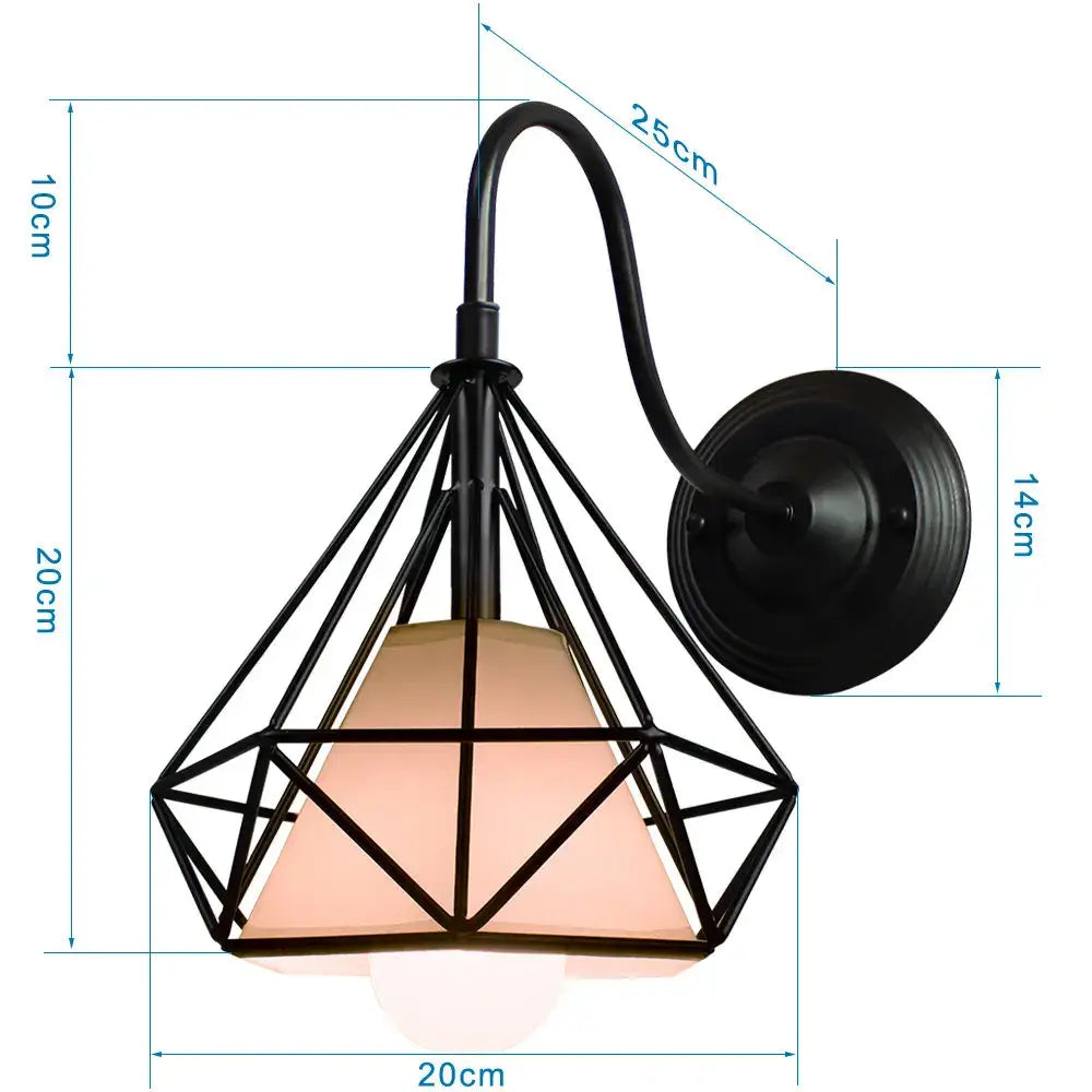 Black metal wall sconce with decorbites iron cage guard and warm-toned glass shade for vintage bedroom lighting