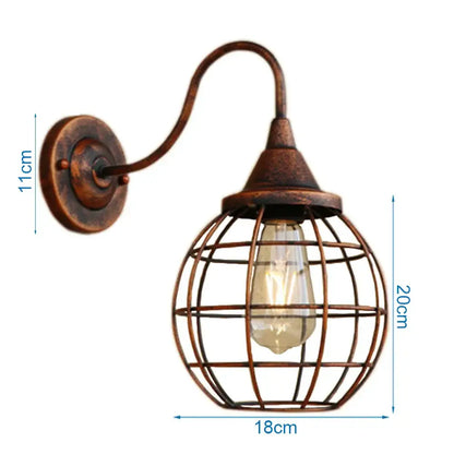 Vintage copper decorbites iron cage wall sconce with exposed Edison bulb and iron cage guard for bedroom lighting