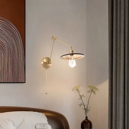 Vintage copper wall sconce with pull chain featuring brass adjustable arm and circular glass shade for bedroom decorbites copper vintage