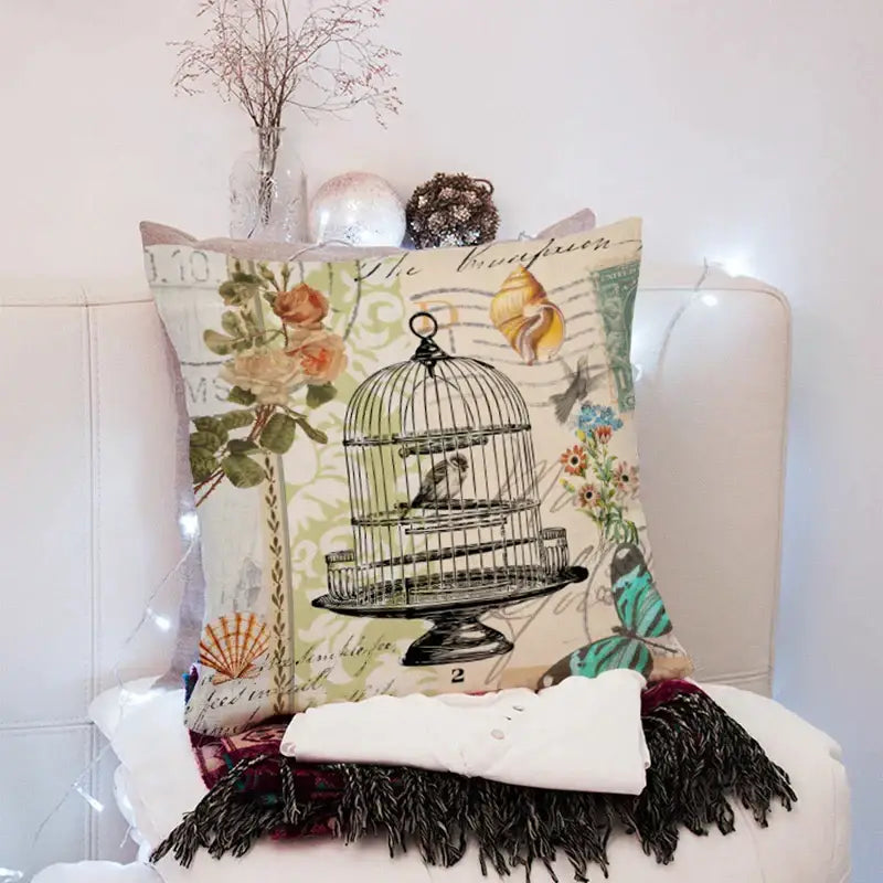 Vintage distressed peach skin 45x45cm throw pillow with black wire birdcage illustration and floral shell decorbites 45x45cm peach