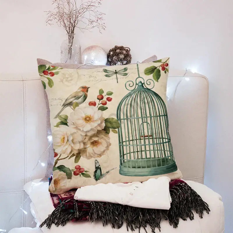 Beige vintage distressed peach skin 45x45cm throw pillow with white flowers red berries birds and ornate green birdcage decorbites 45x45cm peach
