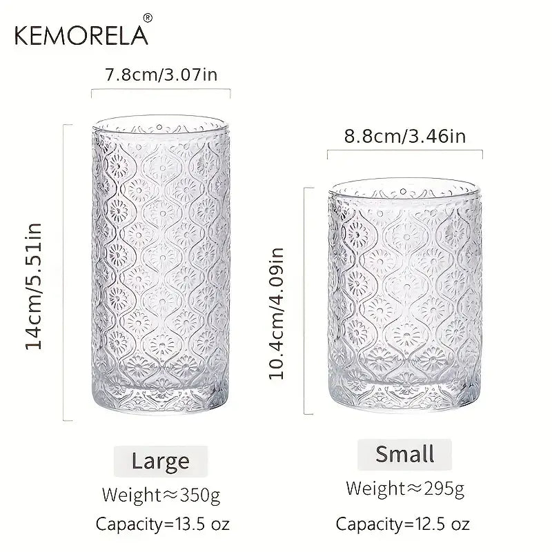 Clear glass tumblers with intricate embossed floral patterns in large and small sizes vintage glassware set