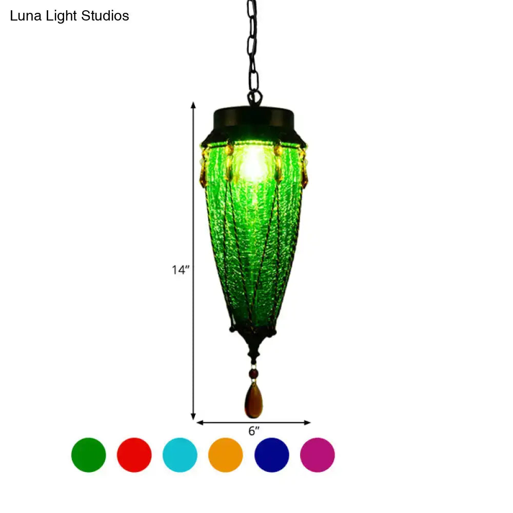 Green textured glass pendant light with black metal chain and amber teardrop accent for vintage restaurant lighting