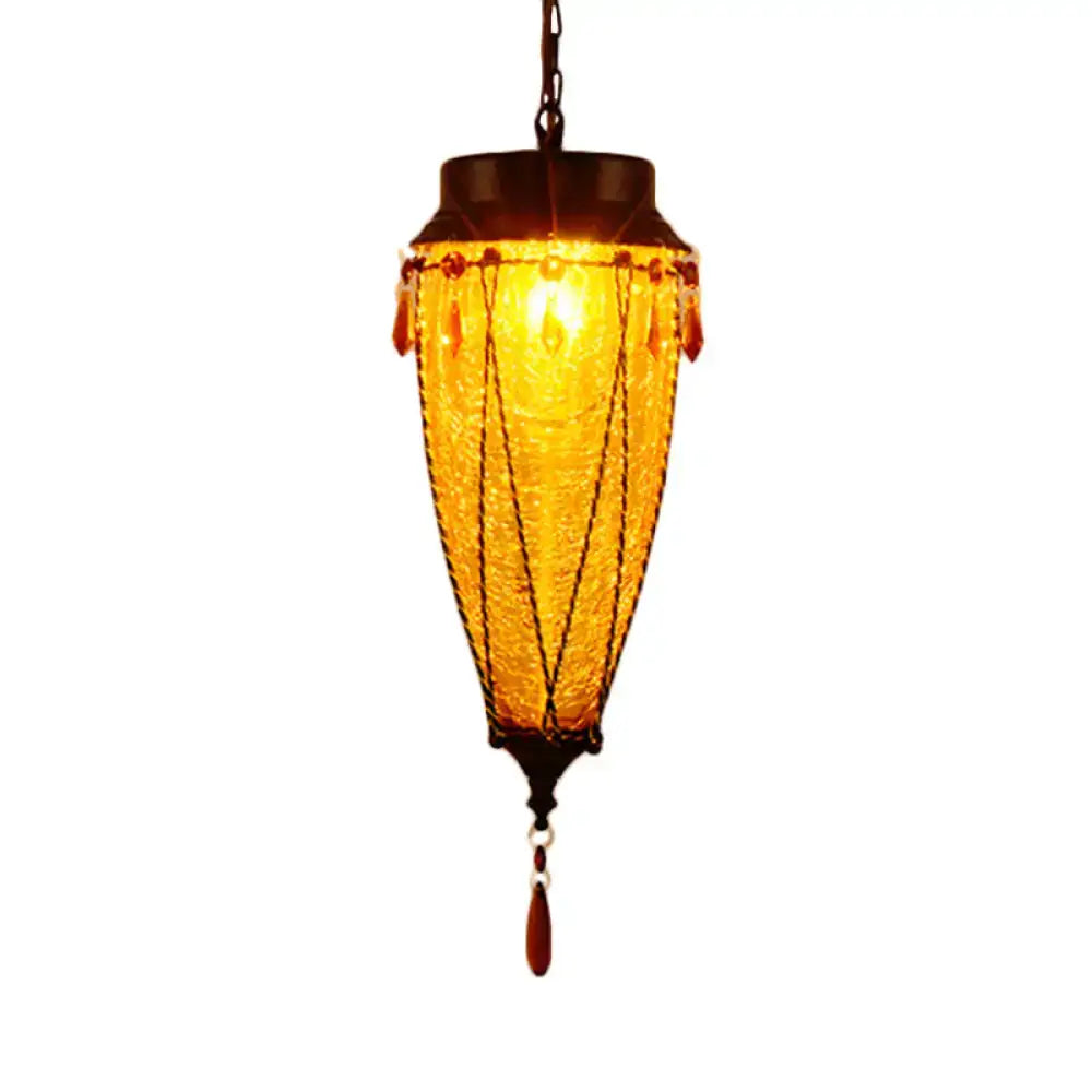 DecorBites warm amber glass pendant light with woven texture and dark metal accents for vintage restaurant lighting