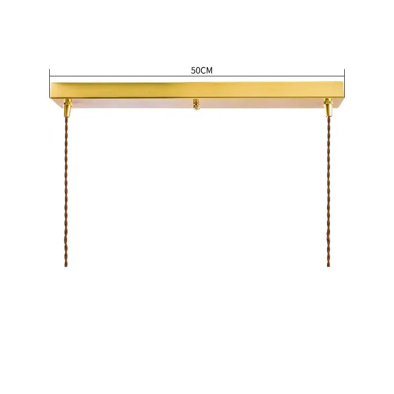 Gold finished rectangular pendant light with twisted brown cords featuring cracked glass by decorbites for living room decor