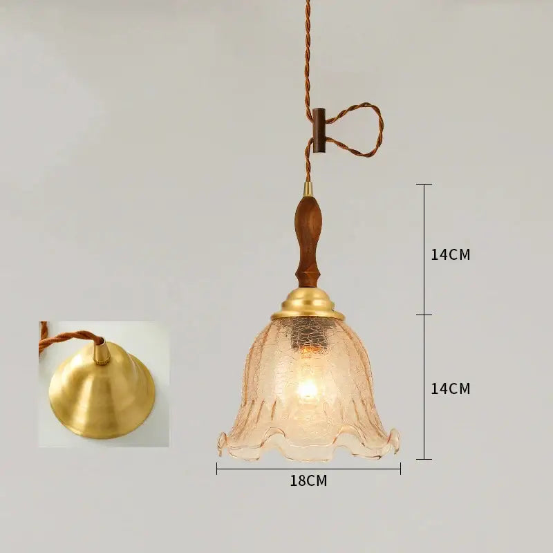 A warm-toned cracked glass pendant light with brass frame and wooden handle for vintage floral decorbites cracked glass designs