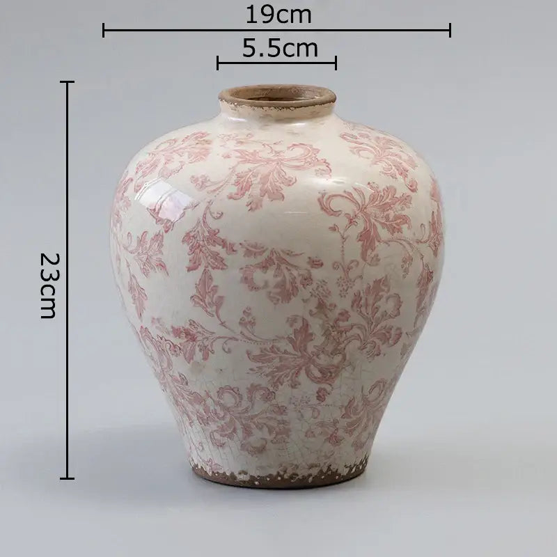 A white ceramic vintage floral vase with cracked texture blue and decorbites cracked texture rim for living room decor