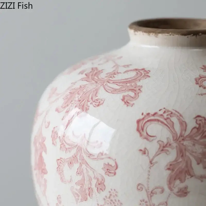 White ceramic vase with pink floral patterns and decorbites cracked texture blue finish for living room decor