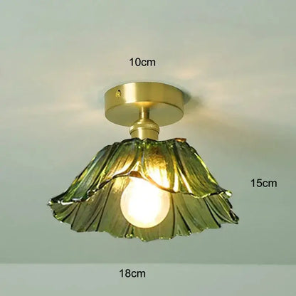 Vintage flower glass pendant light with brass finish and translucent green leaf-shaped glass pendant for dining room