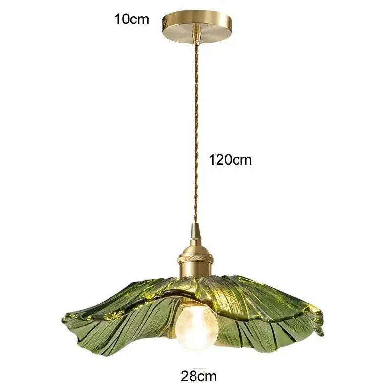 A delicate green glass pendant light with brass finish and twisted cord for vintage flower dining room trio