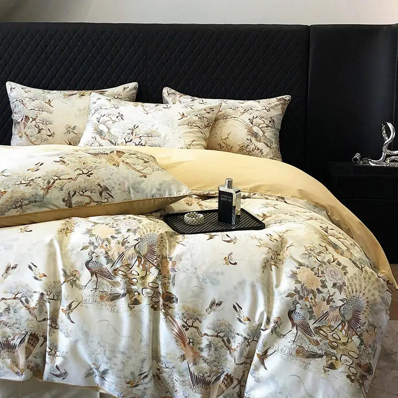 Elegant cream satin bedding set with vintage flowers print featuring intricate bird and floral patterns and gold lining