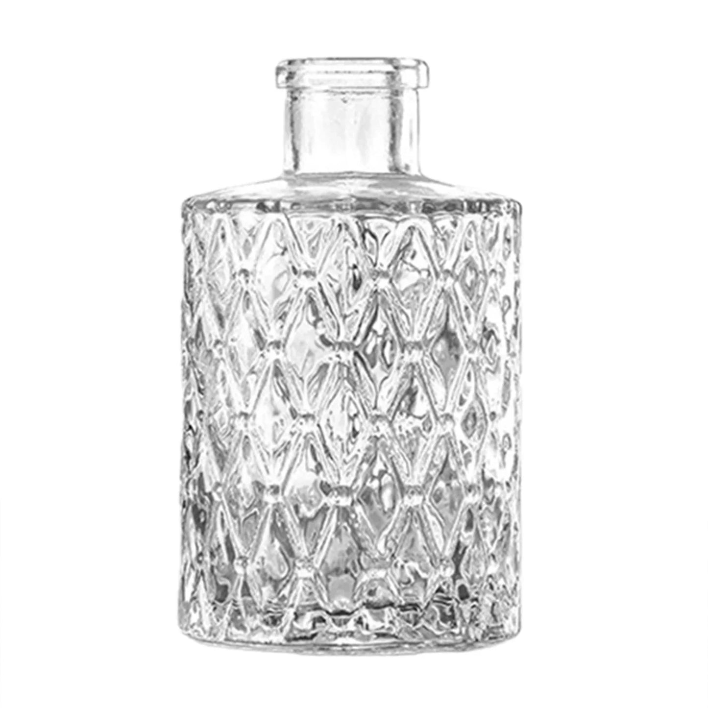 Vintage french clear glass vase with geometric diamond pattern used as ornamental plant pot decor and modern glass vase