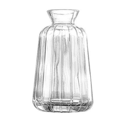 Vintage French clear glass vase with vertical ribbed texture and flared neck for elegant plant pot decor