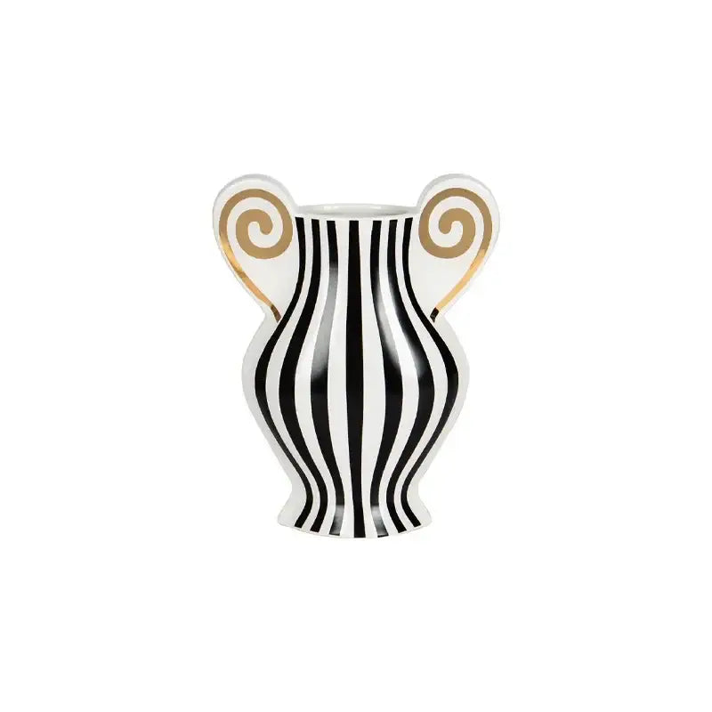 White ceramic vase with bold black vertical stripes and gold spiral accents for decorbites geometric fringe decor