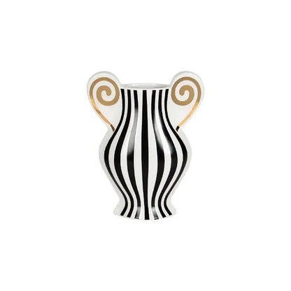 White ceramic vase with bold black vertical stripes and gold spiral accents for decorbites geometric fringe decor