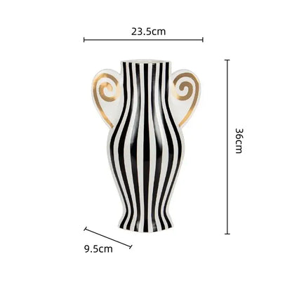 A sleek black and white geometric fringe ceramic vase with gold spiral handles for decorbites living room decor