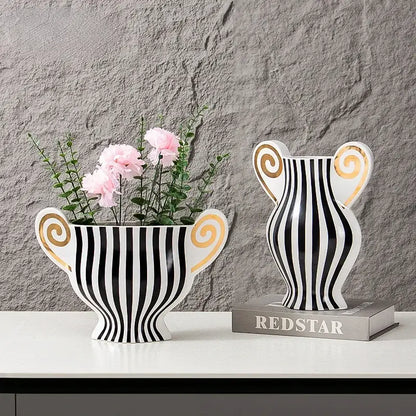 Black and white geometric fringe ceramic vase with gold spiral handles for living room decor by decorbites geometric fringe